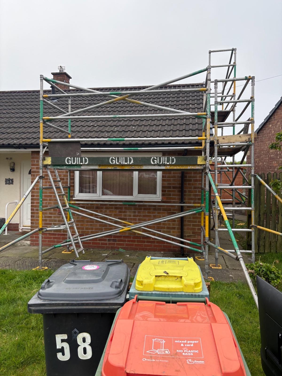Small semi-detached house with Guild Scaffolding boards